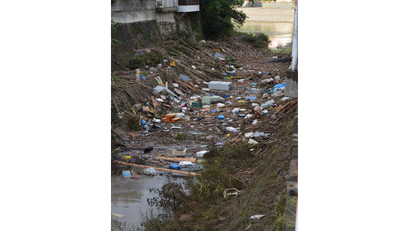3. Living goods drawn by the floods remain on the road / 9th July, Ehime ©JPF