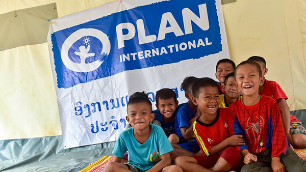 Children smiling at the child-friendly space ©Plan International