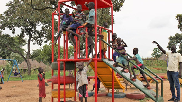 South Sudanese children playing in child-friendly space ©PLAN