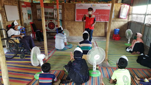 WVJ’s awareness-raising activity on infection prevention as part of its project. Activities targeted women, children, and persons with disabilities. ©WVJ